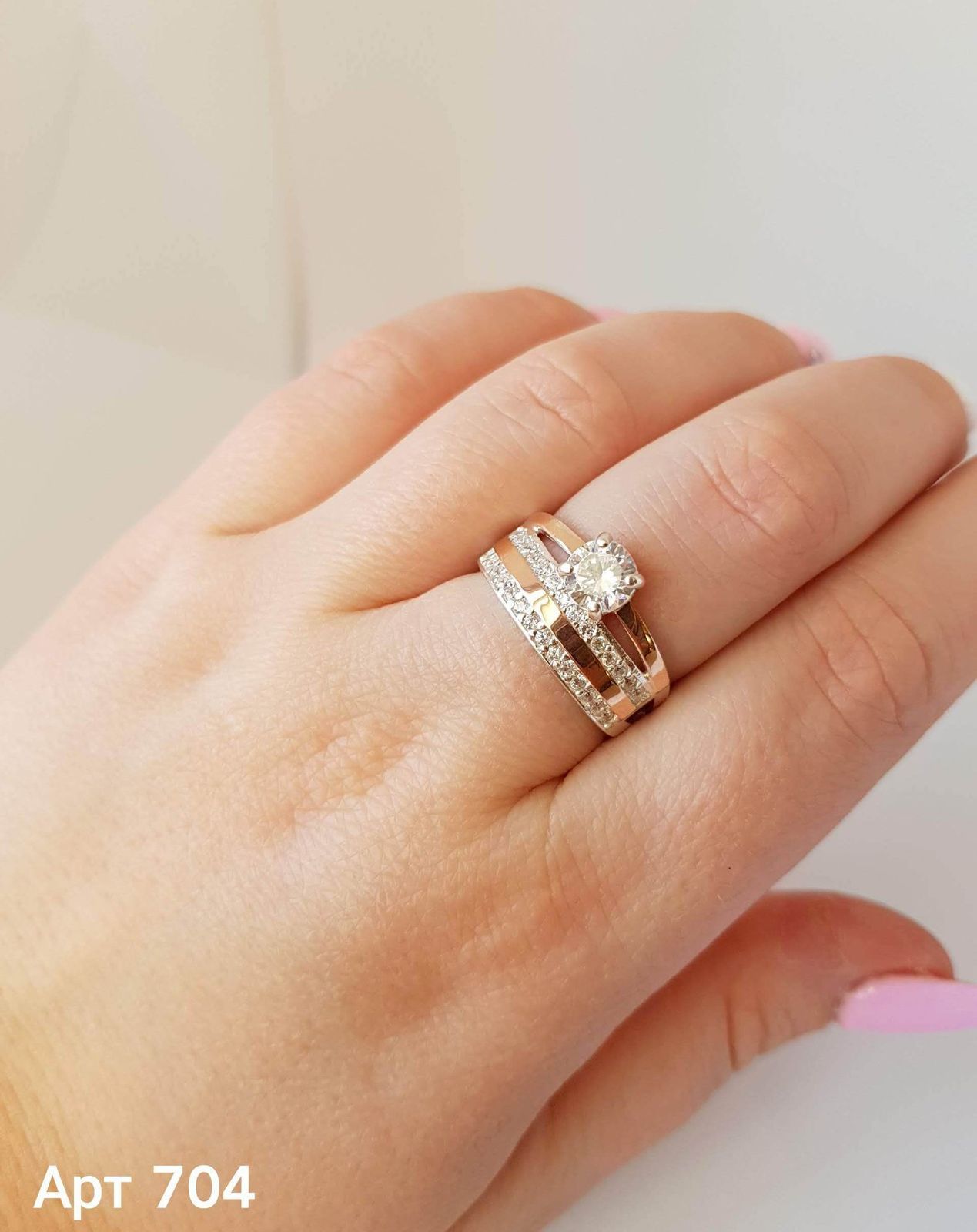 Срібна каблучка з золотими вставками