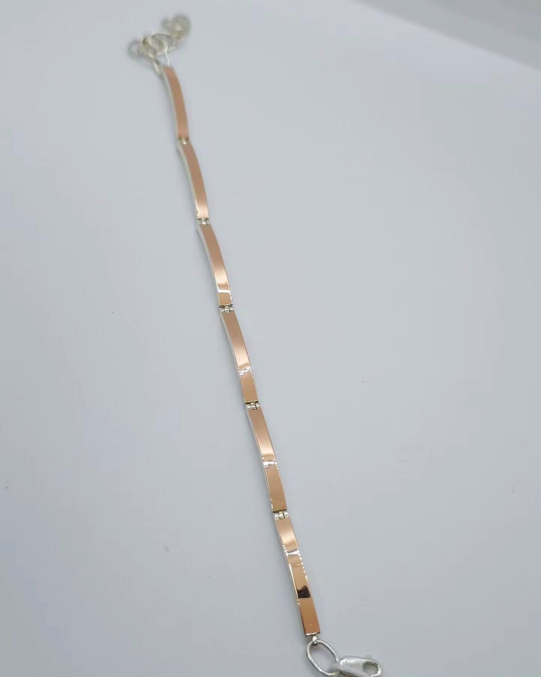 Срібний браслет з золотими вставками