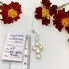 Срібний хрестик з перлинами